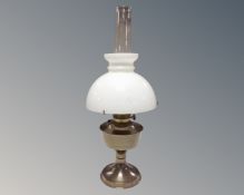 An Aladdin chrome oil lamp with chimney and shade