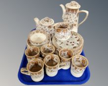 A tray of twenty two piece Fosters pottery tea service
