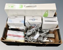 A Nintendo Wii fit together with Wii accessory pack and games
