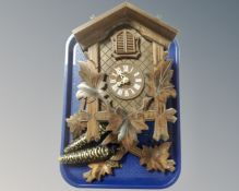 A vintage wooden cuckoo clock