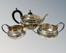A silver harlequin three-piece tea service, the teapot John Batt & Co Ltd, Sheffield 1930,