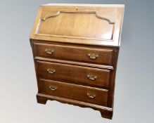 A 20th century bureau fitted with drawers