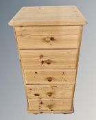 A five drawer pine chest