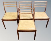 A set of four mid century teak G-Plan dining chairs