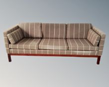 A Scandinavian three seater settee in two-tone fabric