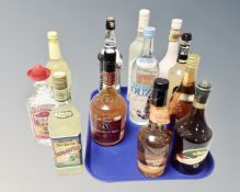 A collection of alcohol to include Tequila, Margarita,