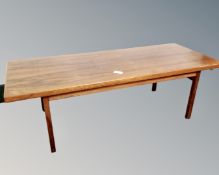A mid century rosewood coffee table