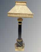 A vintage table lamp with shade