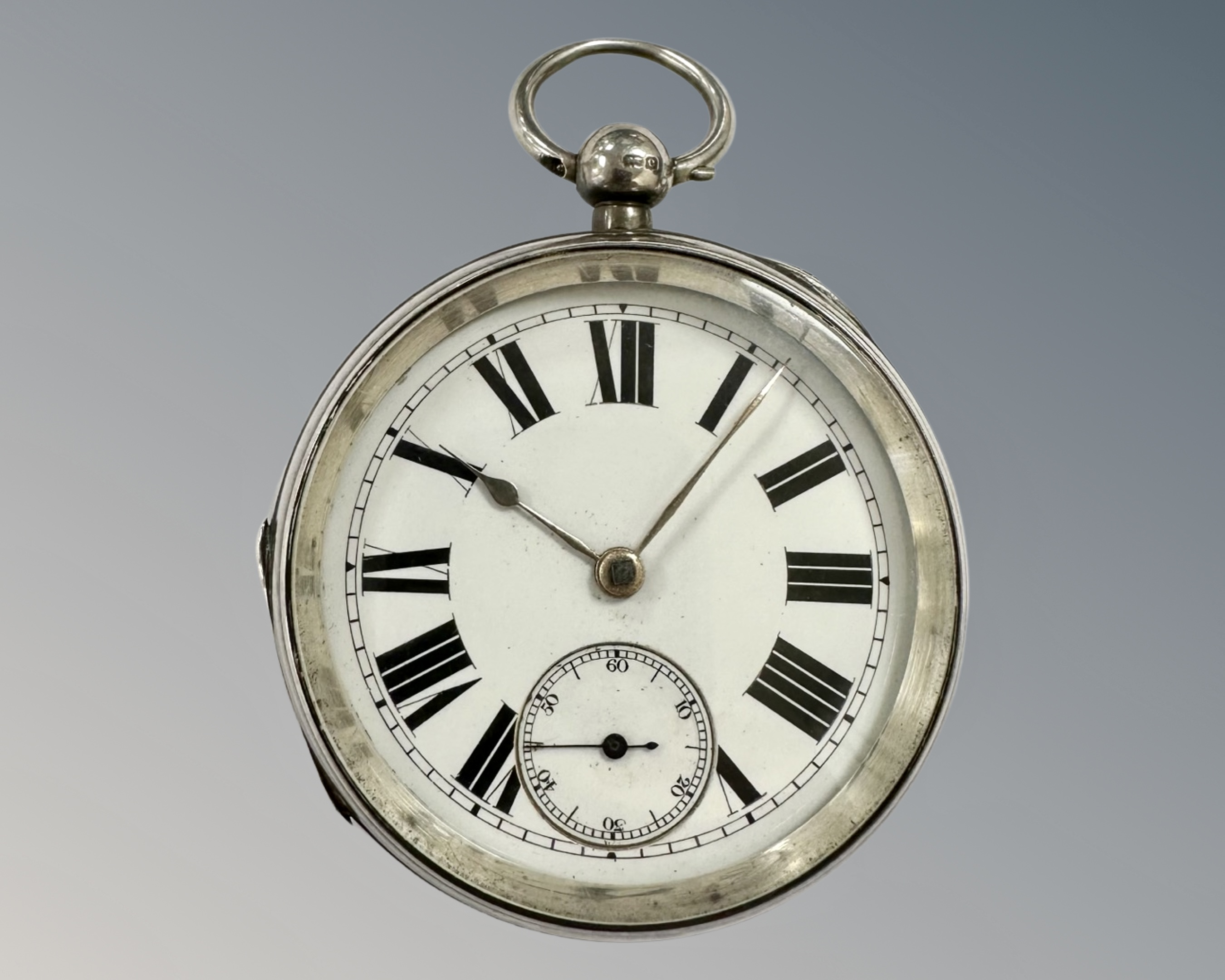 A silver open-faced key-wound pocket watch by The American Watch Co, Waltham, Massachusetts,
