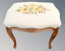 A continental walnut framed dressing table stool