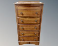 A mid century five drawer Gentleman's chest