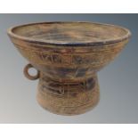 A studio pottery bowl of Aztec design