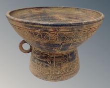A studio pottery bowl of Aztec design
