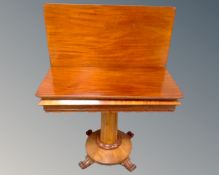 A Victorian mahogany turnover top tea table