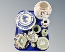 A tray containing several pieces of Wedgwood green jasperware,