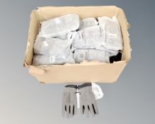 A box of black and grey winter running gloves, various sizes, new.