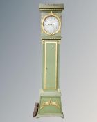 A Continental longcase clock in painted and gilt case with pendulum and weights