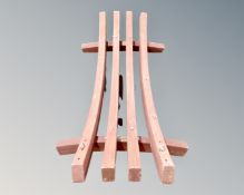 A wooden hammock frame
