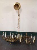 A brass floor lamp together with two vintage ceiling lights