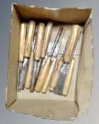 A box of ten vintage Swiss made wood working chisels