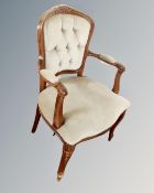 A Continental carved salon chair in green dralon