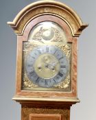 A longcase clock with brass and silvered dial signed Mathiesen,