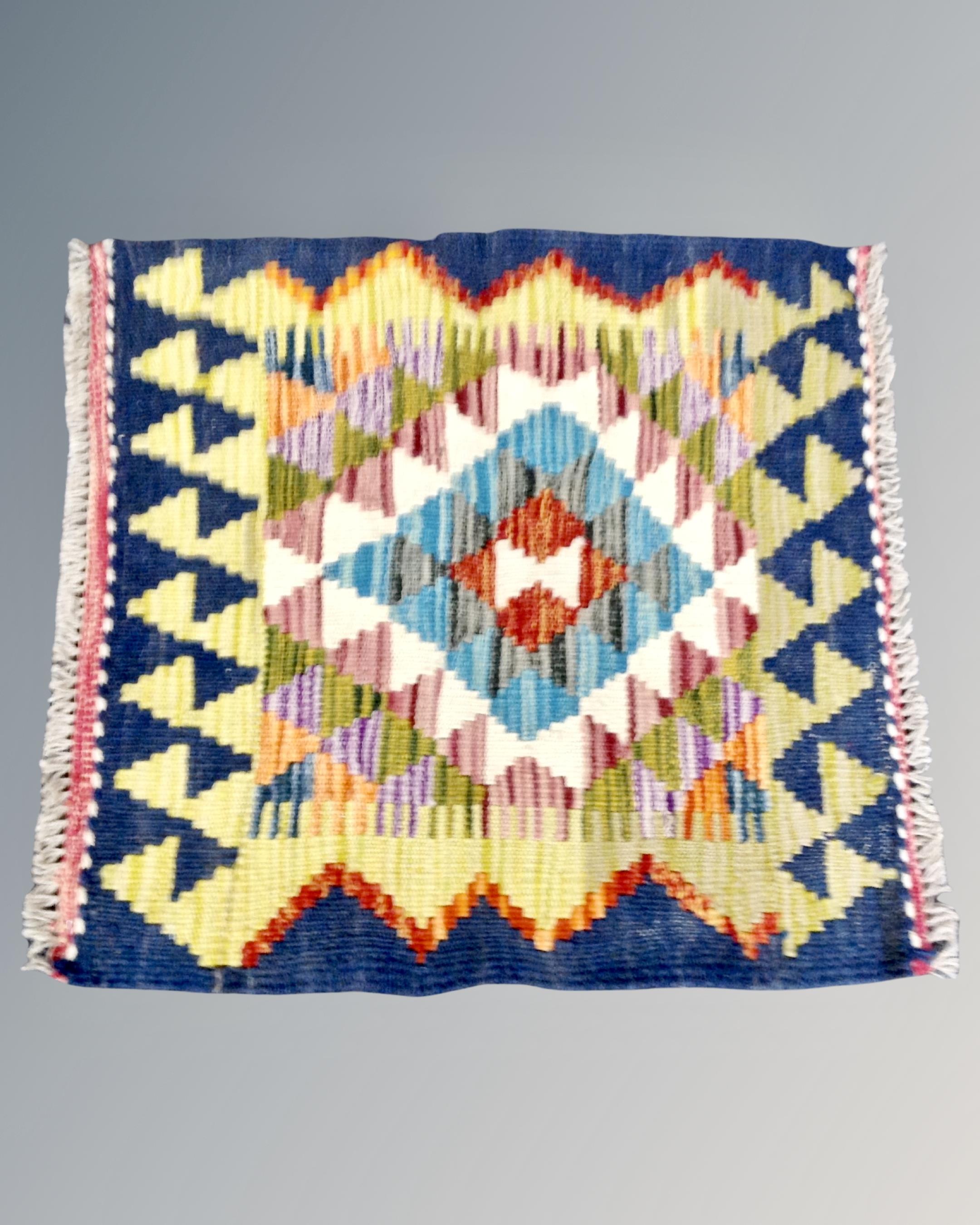 A Chobi Kilim 54 cm x 52 cm