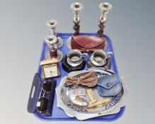 A tray of chrome plated candlesticks, cigarette lighter, folding clock,