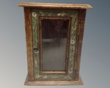 A glazed door key cabinet,