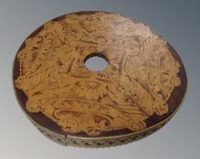 A 19th century marquetry inlaid wine table top with brass gallery