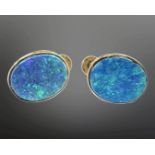 A pair of 9ct gold doublet opal earrings with screw backs, opals 12.