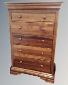 A Willis and Gambier cherry wood five drawer chest