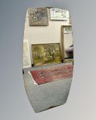 An early 20th century frameless shaped mirror, 65cm by 126cm.