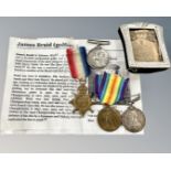 A group of medals comprising a 1914 Star entitled to one bar,