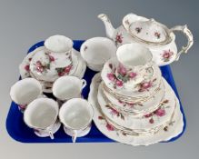 A tray of Hammersley rose pattern tea china.