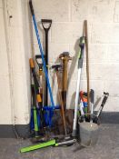 A quantity of garden and hand tools, galvanized watering can,