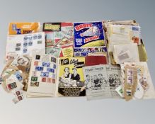A box containing a large quantity of stamps, envelopes and loose stamps.