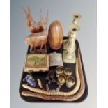 A tray of wooden carved animals, a pair of brass candlesticks, a white metal bangle, cloisonne pig.
