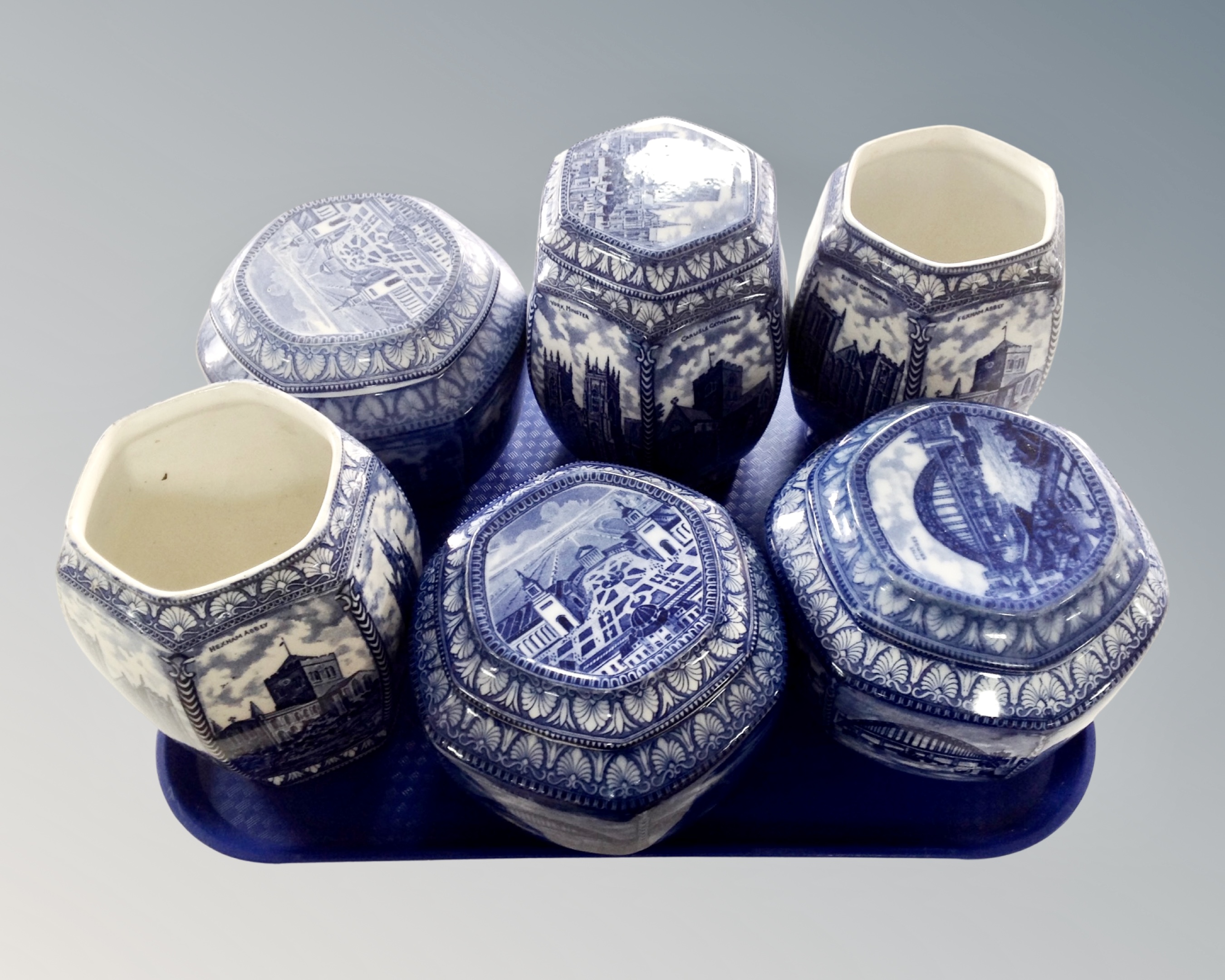 Six Maling ware blue and white caddies.