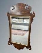 A Georgian style mahogany mirror, 38cm by 67cm.