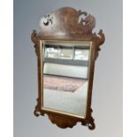 A Georgian style mahogany mirror, 38cm by 67cm.