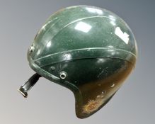 An early 20th century Royal Corps of Transport cycle helmet.
