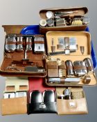 A tray of gentleman's travel sets including chrome plated examples.