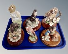 A collection of Border Fine Arts figures including otters, beach combers, tawny owl etc.