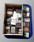 A collection of Magic: The Gathering trading cards, dice etc.