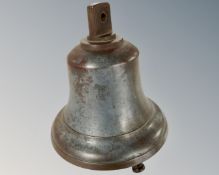 A large antique brass bell.