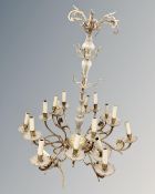 An antique brass and glass eighteen-way chandelier (as found)