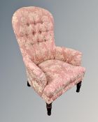 A Victorian style lady's chair in pink floral fabric
