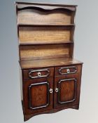 A double door Welsh dresser in an oak finish