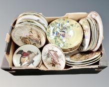 A box containing a large collection of Franklin porcelain weights and other collectors plates.